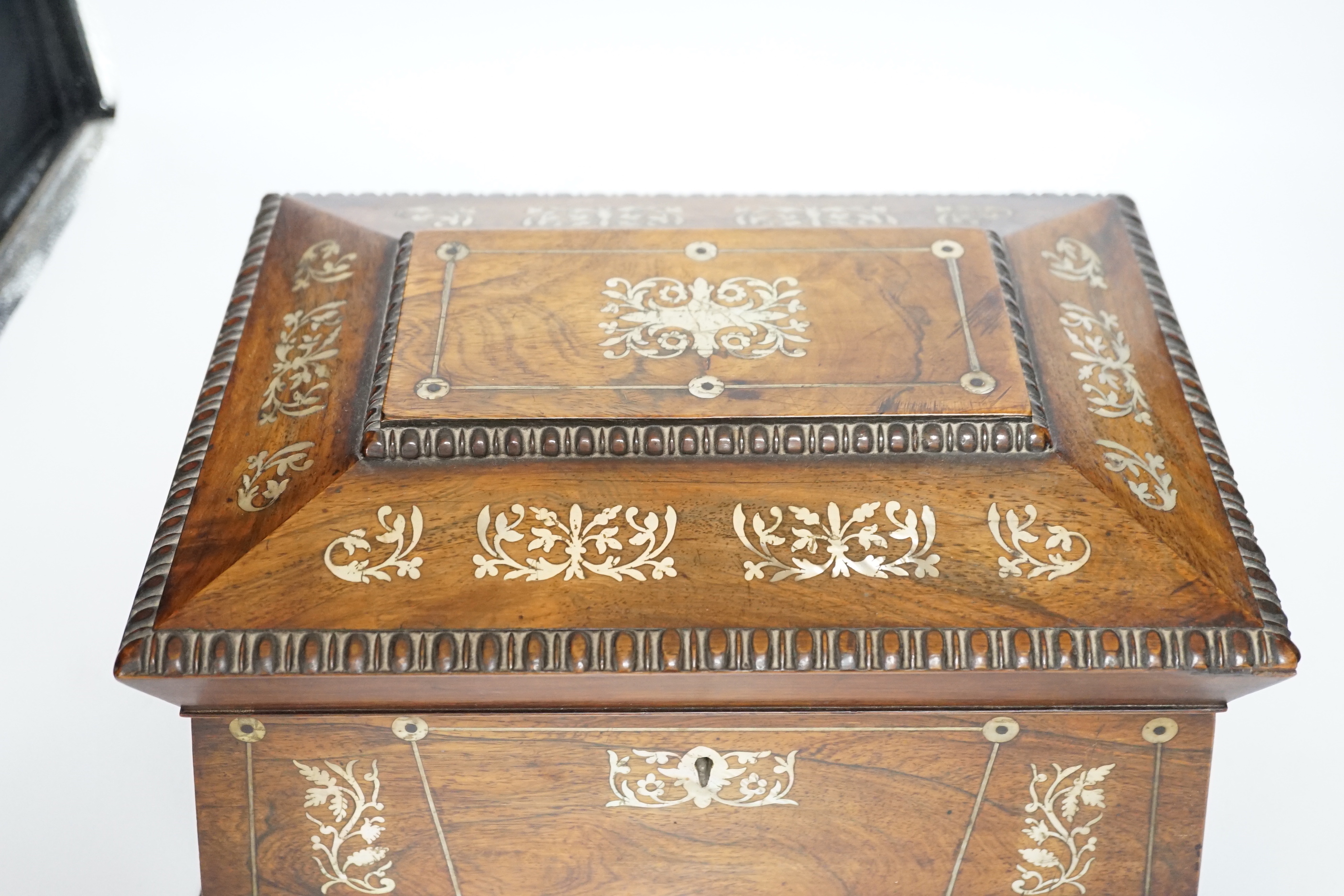 A William IV mother of pearl inlaid rosewood jewellery casket, 30cm wide